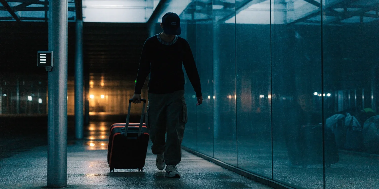 Covered walkway to the terminals at night